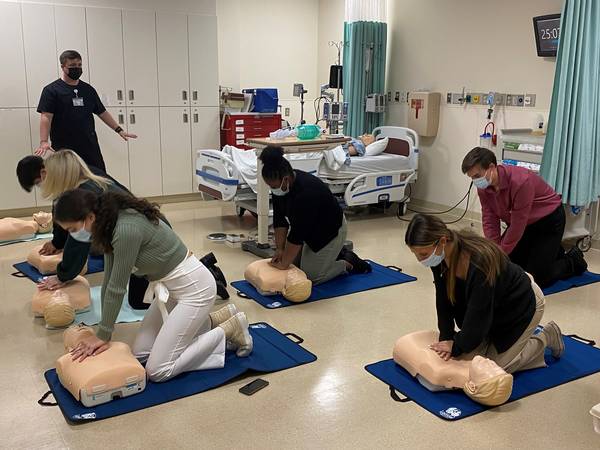 Students learning CPR at Hartford Healthcare CESI