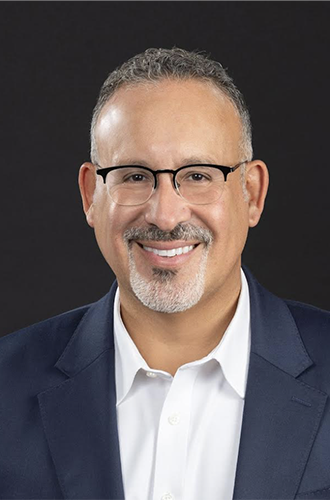 Image of Miguel Cardona