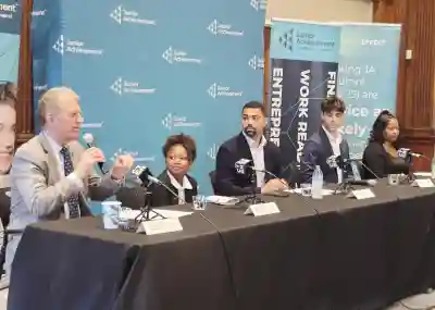 Panelists stand proudly at JA's National Financial Awareness Day Panel